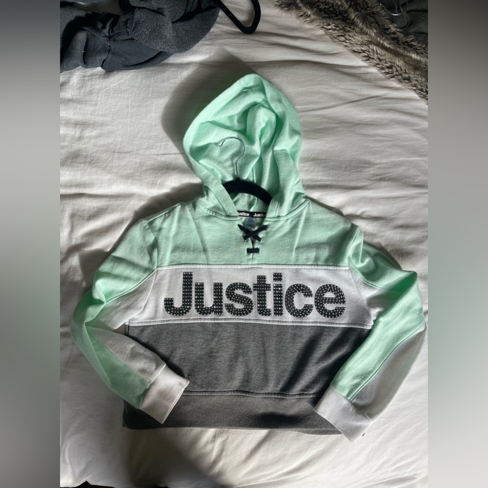 2/$20 CUTE Justice hoodie in good condition with silver dot detail size 10